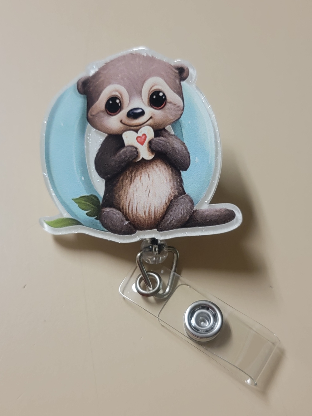 Cute Brown Otter Badge Reel with Blue Backing